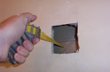 1-Cut away damaged drywall.