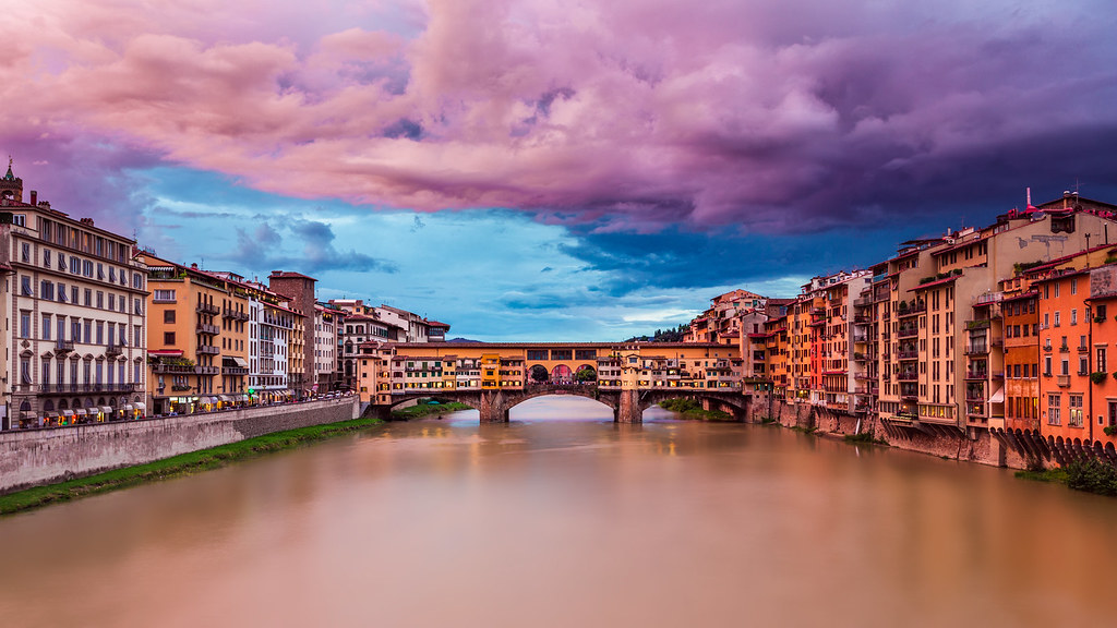 Ponte Vecchio bridge Florence sunset Arno river